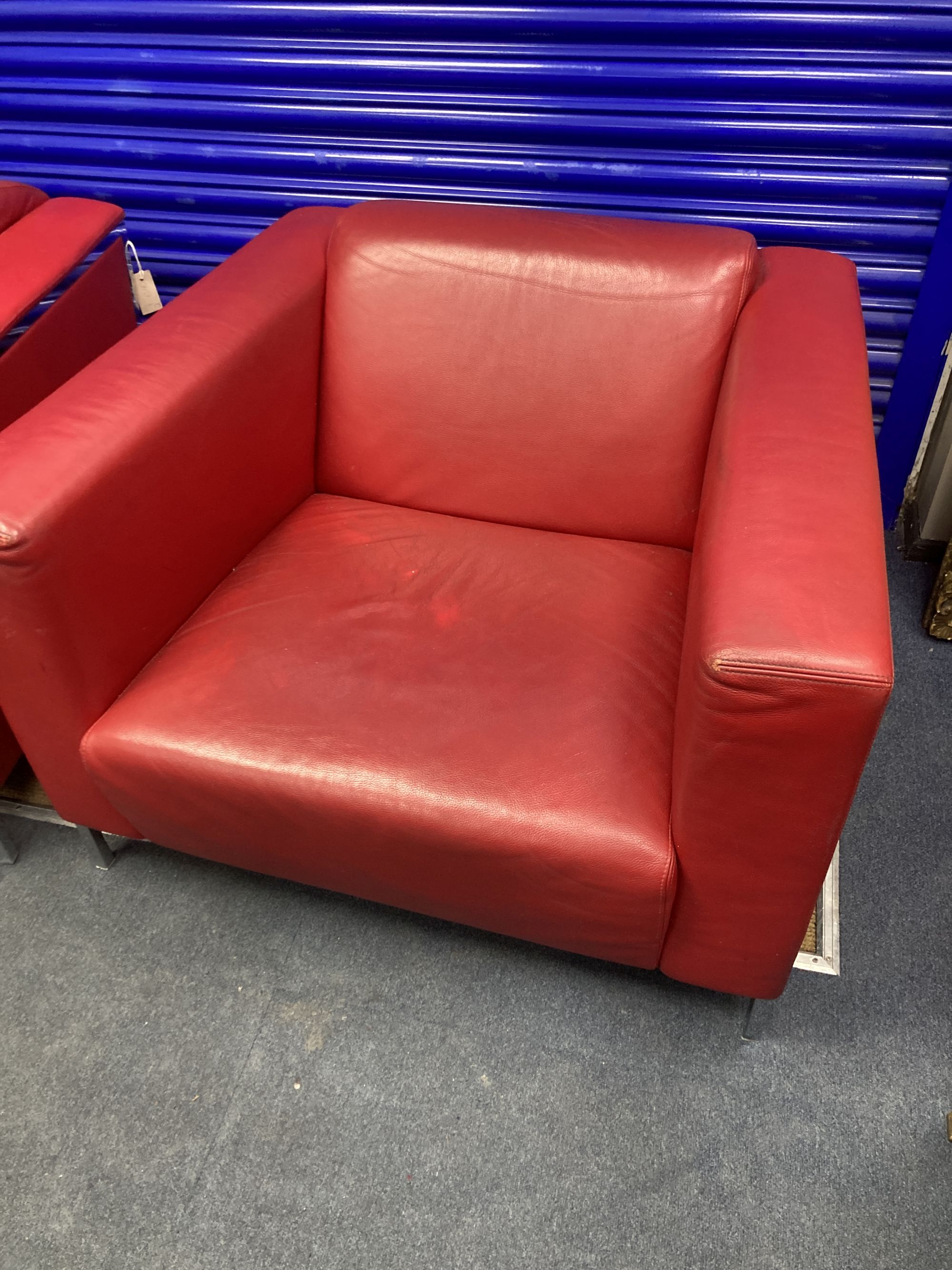 A pair of Italian mid-century armchairs by Moruso, width 94cm, depth 83cm, height 64cm